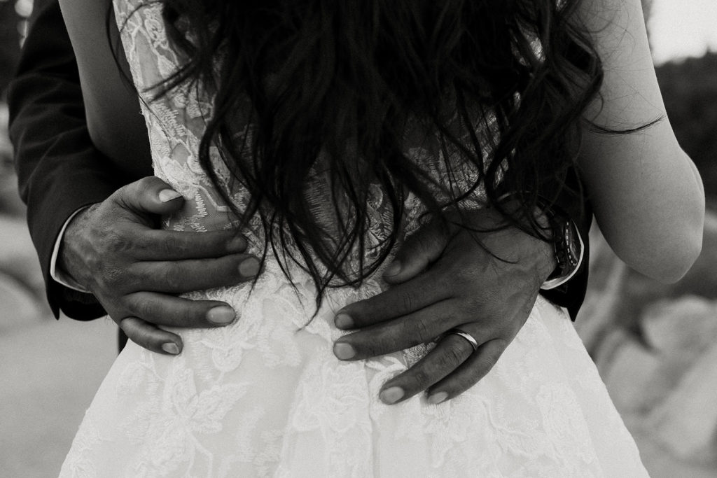 rachelchristophersonphotos-glacier point yosemite elopement-yosemite elopement-glacier point elopement-mountain top elopement-northern california elopement-bride and groom-slick black suit-lacey floral wedding gown-black and white wedding photos