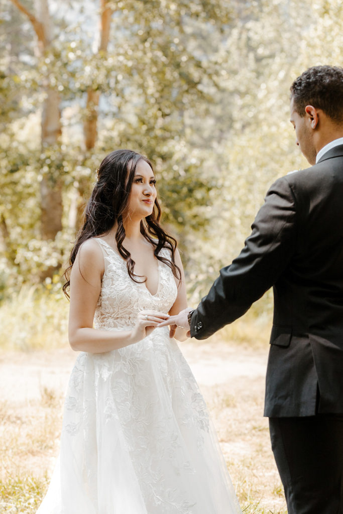 rachelchristophersonphotos-swinging bridge-yosemite elopement-yosemite elopement-swinging bridge elopement-mountain top elopement-northern california elopement-bride and groom-slick black suit-lacey floral wedding gown
