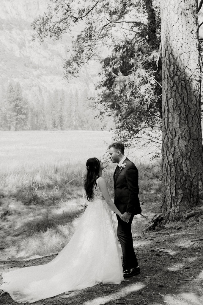 rachelchristophersonphotos-swinging bridge-yosemite elopement-yosemite elopement-swinging bridge elopement-mountain top elopement-northern california elopement-bride and groom-slick black suit-lacey floral wedding gown-black and white wedding photos