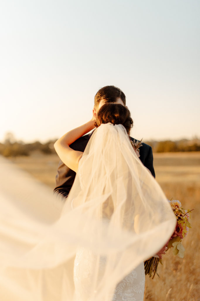 Rachel Christopherson Photography - rustic wedding venue, barn wedding, barn wedding reception, northern california, northern california wedding, northern california wedding photographer, sacramento wedding venues, sacramento wedding, sacramento wedding photographer, sacramento wedding photos, sacramento wedding photography, golden hour wedding photos, modern barn wedding, classy barn wedding, elegant barn wedding, bride and groom photos, golden hour photos, golden hour portriats, lace wedding dress, low back wedding dress, open back wedding dress, golden hour wedding portraits, golden hour wedding portrait photos, bridal veil