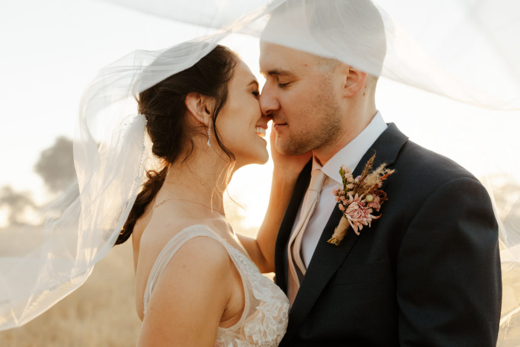 Rachel Christopherson Photography - rustic wedding venue, barn wedding, barn wedding reception, northern california, northern california wedding, northern california wedding photographer, sacramento wedding venues, sacramento wedding, sacramento wedding photographer, sacramento wedding photos, sacramento wedding photography, golden hour wedding photos, modern barn wedding, classy barn wedding, elegant barn wedding, bride and groom photos, golden hour photos, golden hour portriats, lace wedding dress, low back wedding dress, open back wedding dress, golden hour wedding portraits, golden hour wedding portrait photos, bridal veil