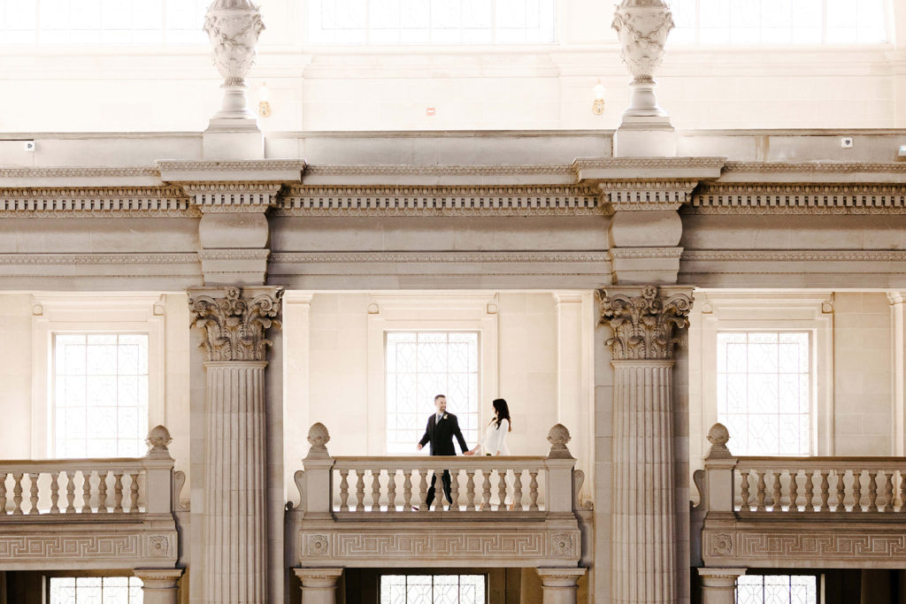 Rachel Christopherson Photographer-SF, San Francisco city hall elopement, san francisco wedding, bride and groom candid wideshot portrait