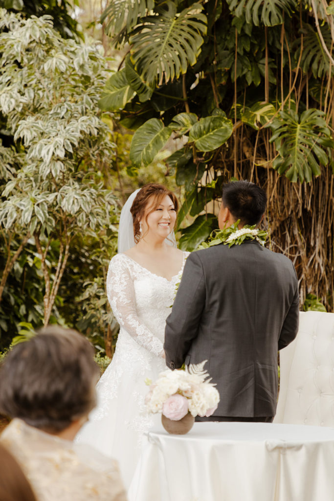 Rachel Christopherson Photography - North Shore Oahu wedding at Sunset Ranch, wedding ceremony photos, bride and groom exchanging vows