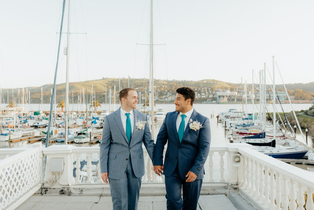 Rachel C Photography - grooms walking on glen cove marina