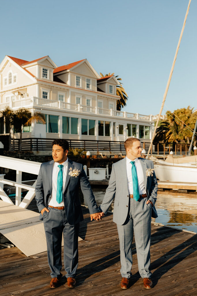 Rachel C Photography - Grooms holding hands on glen cove marina