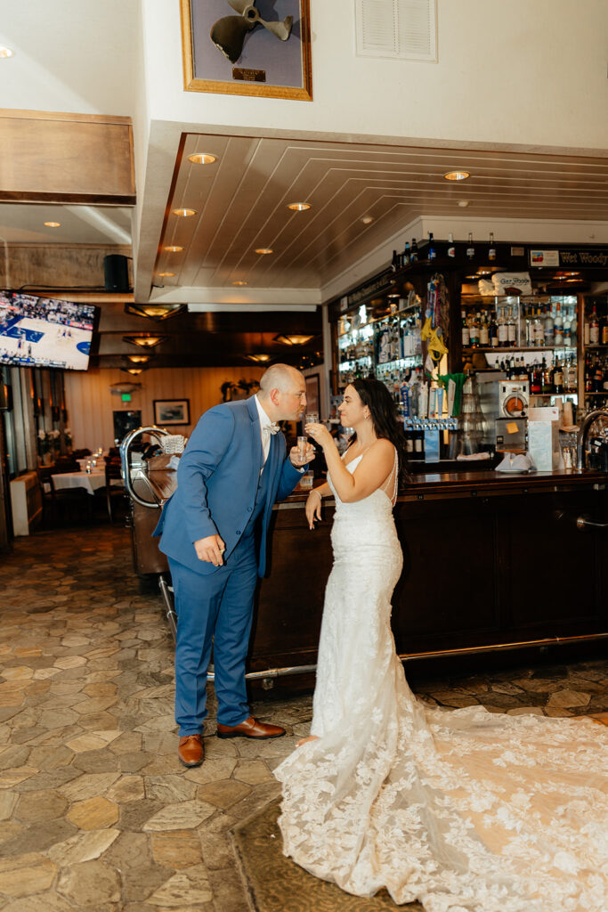 Bride and groom bar portraits in Gar Woods