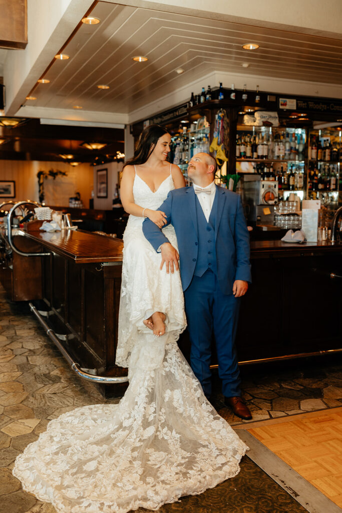 Bar portraits of bride and groom