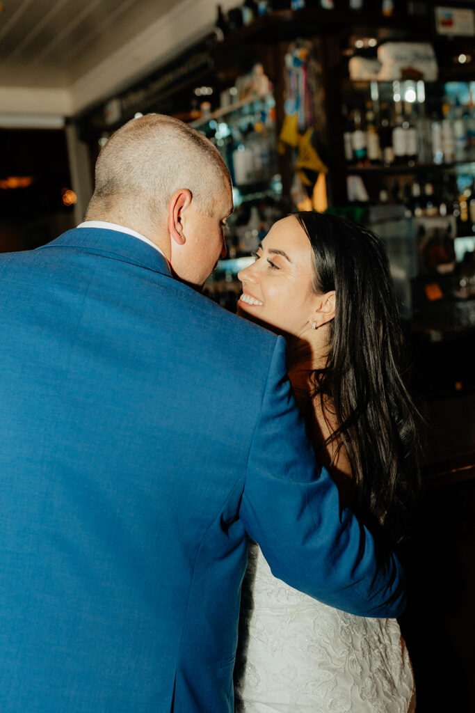 Bride and groom bar portraits in Gar Woods