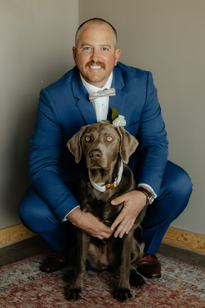 Groom and dog