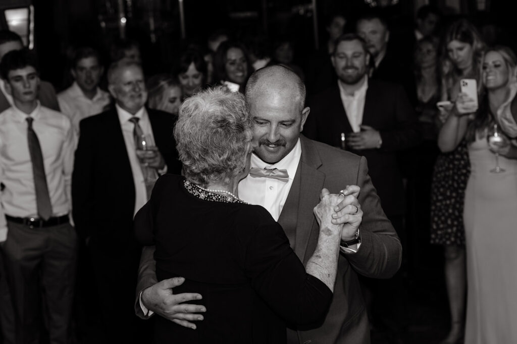 Groom and mother dancing