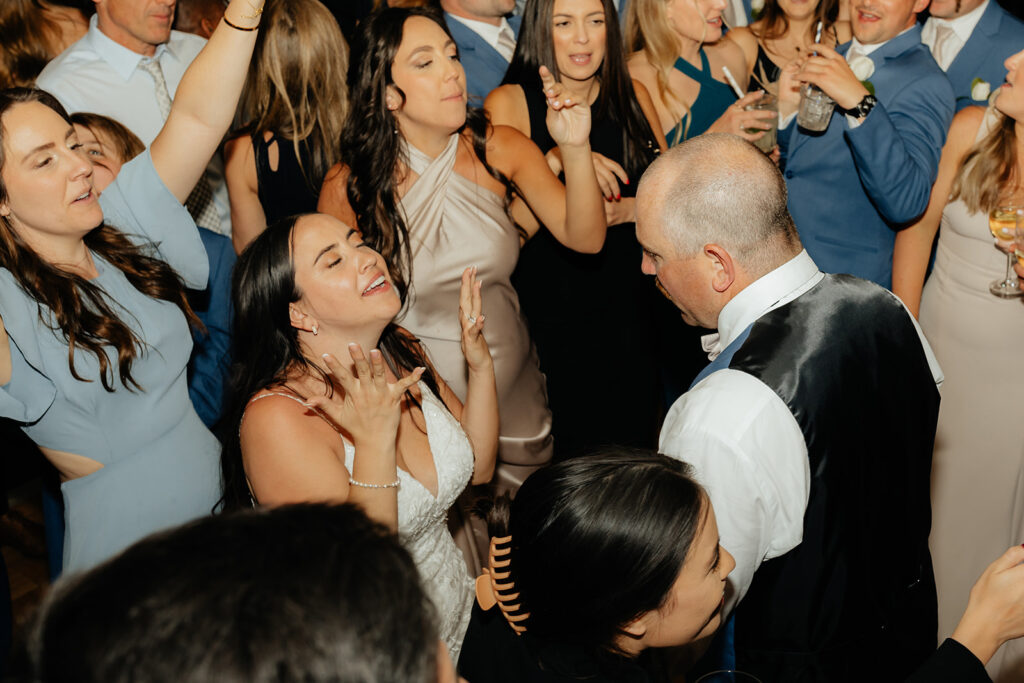 Bride and groom dancing during reception