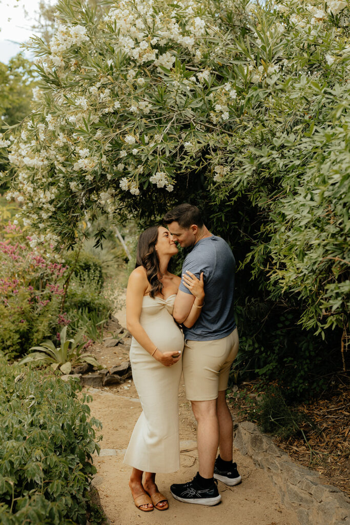 Couple posing for photos in park
