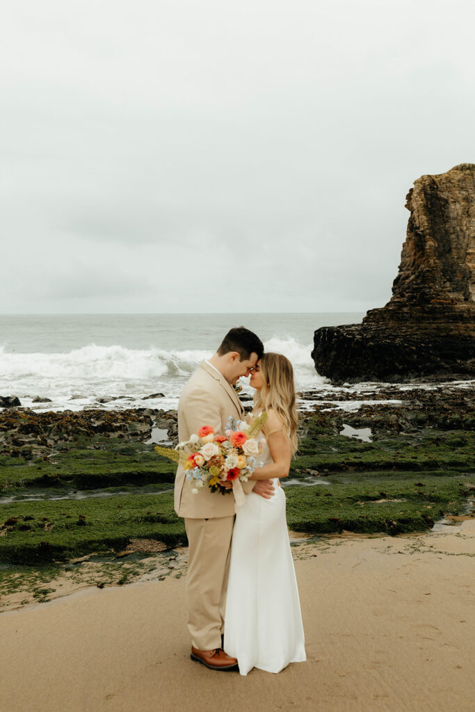 Bride and groom portraits from California elopement on Davenport Beach - Santa Cruz Elopement