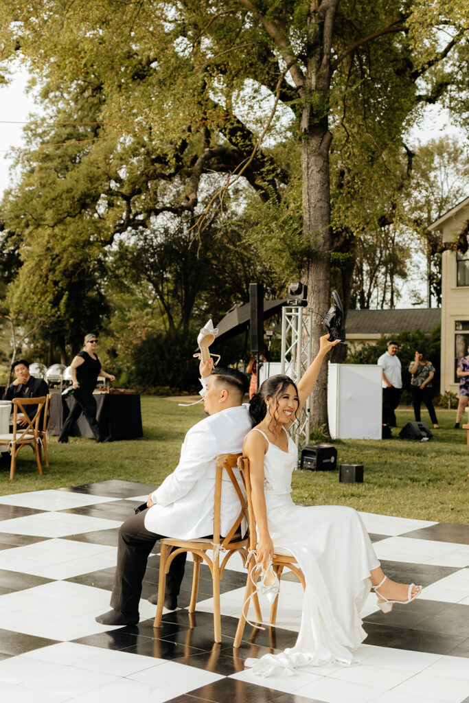 Bride and groom playing reception games