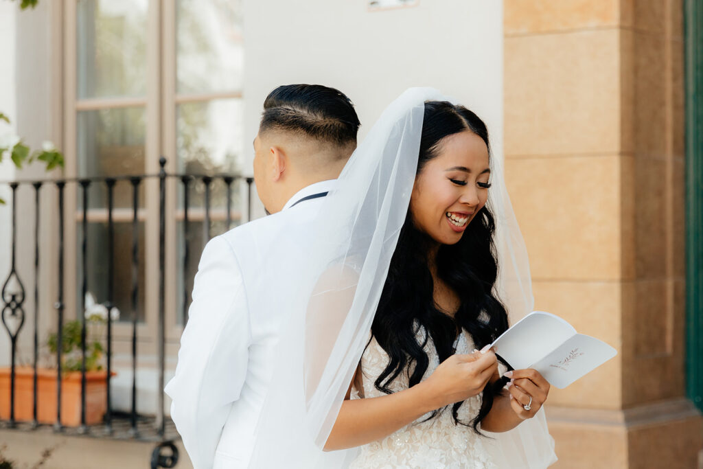 Bride and groom exchanging private vows before ceremony