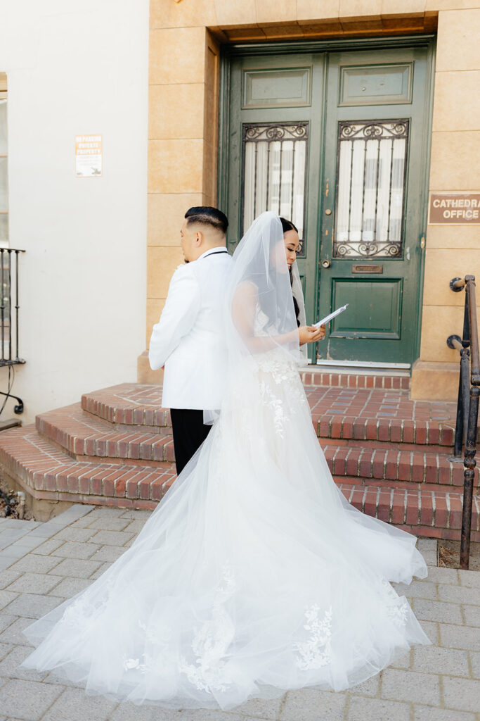 Bride and groom exchanging private vows before ceremony
