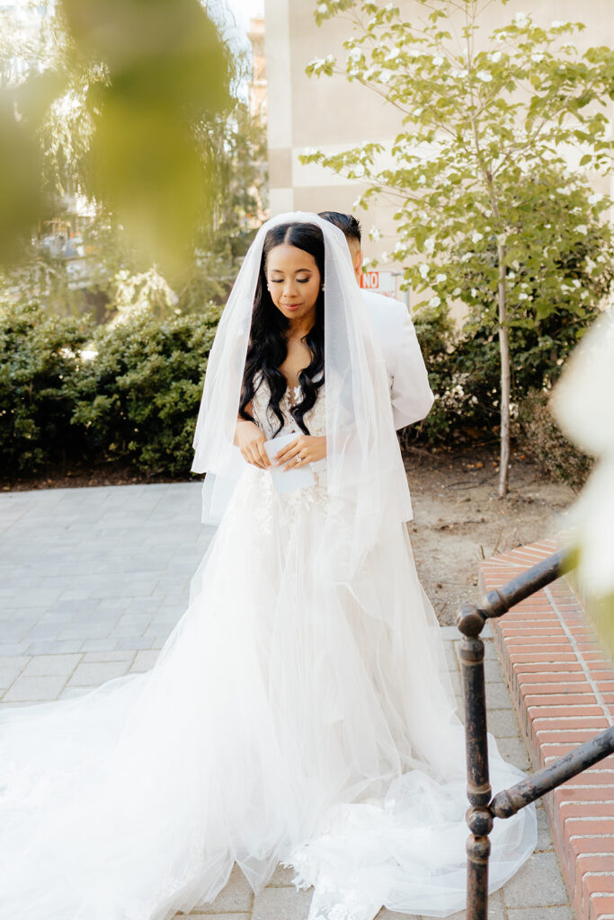 Bride and groom exchanging private vows before ceremony