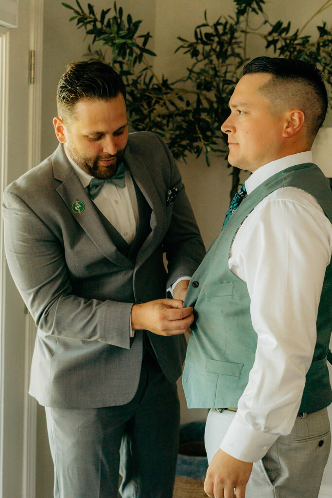 Groom getting ready for wedding ceremony