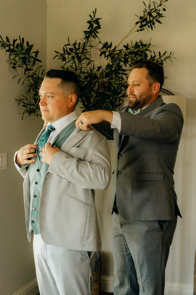 Groom getting ready for wedding ceremony