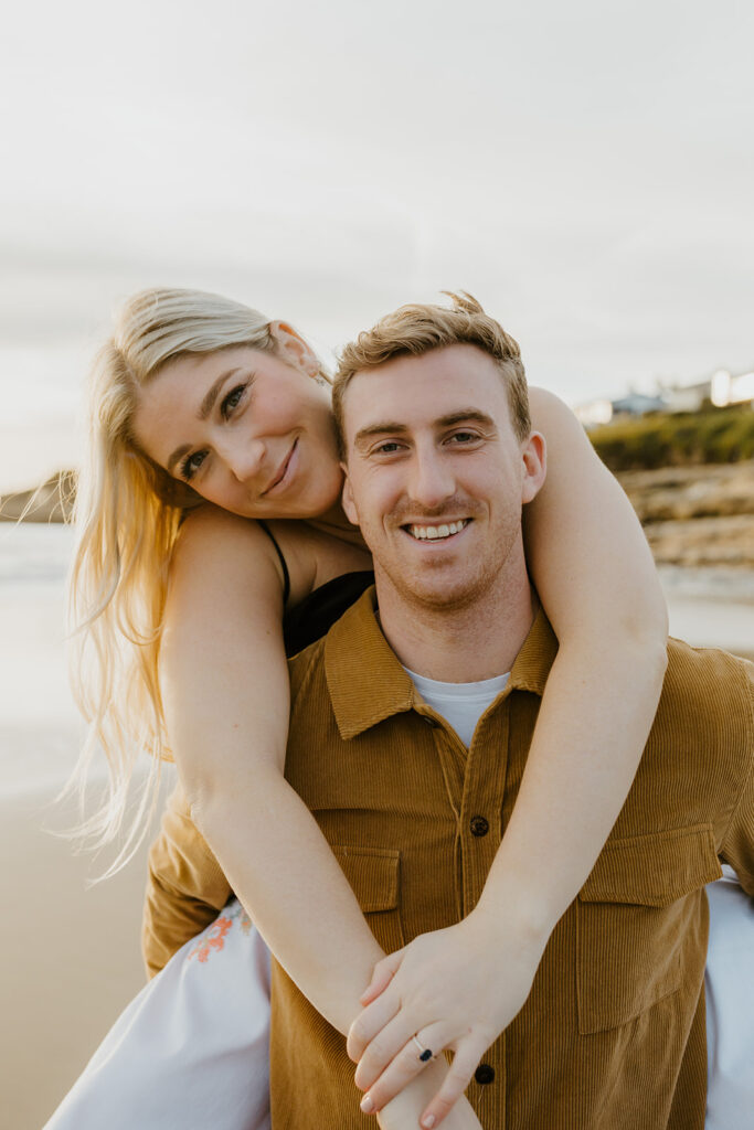 Casual sunset engagement photos at Natural Bridges State Beach in Santa Cruz, CA