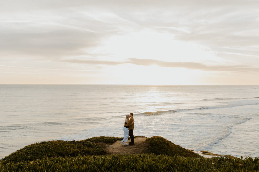 Casual sunset engagement photos at Natural Bridges State Beach in Santa Cruz, CA