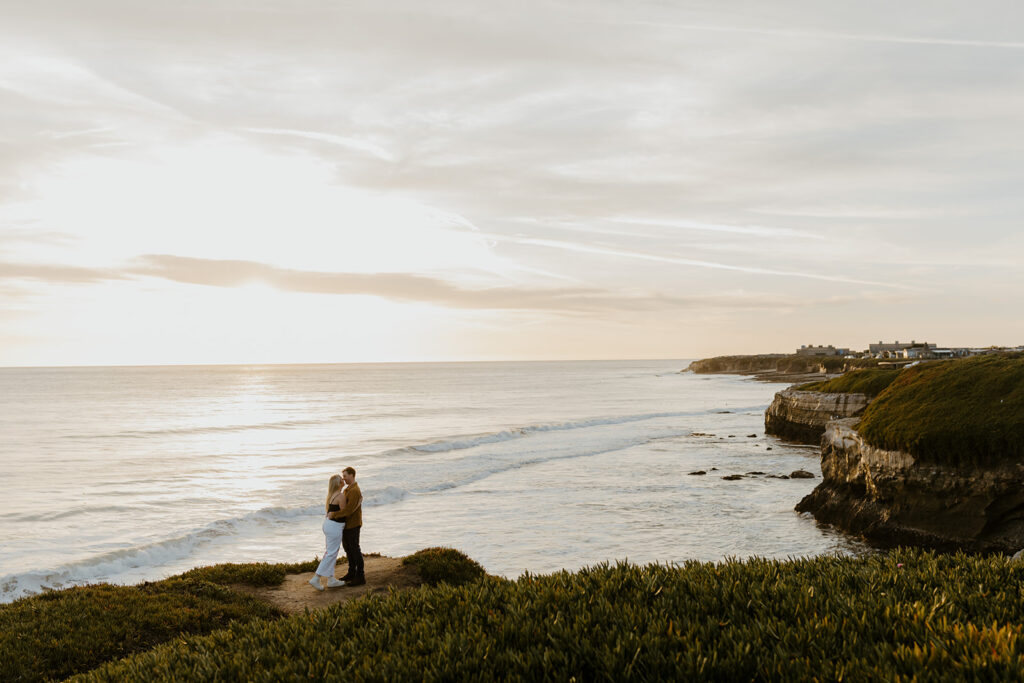 Casual sunset engagement photos at Natural Bridges State Beach in Santa Cruz, CA