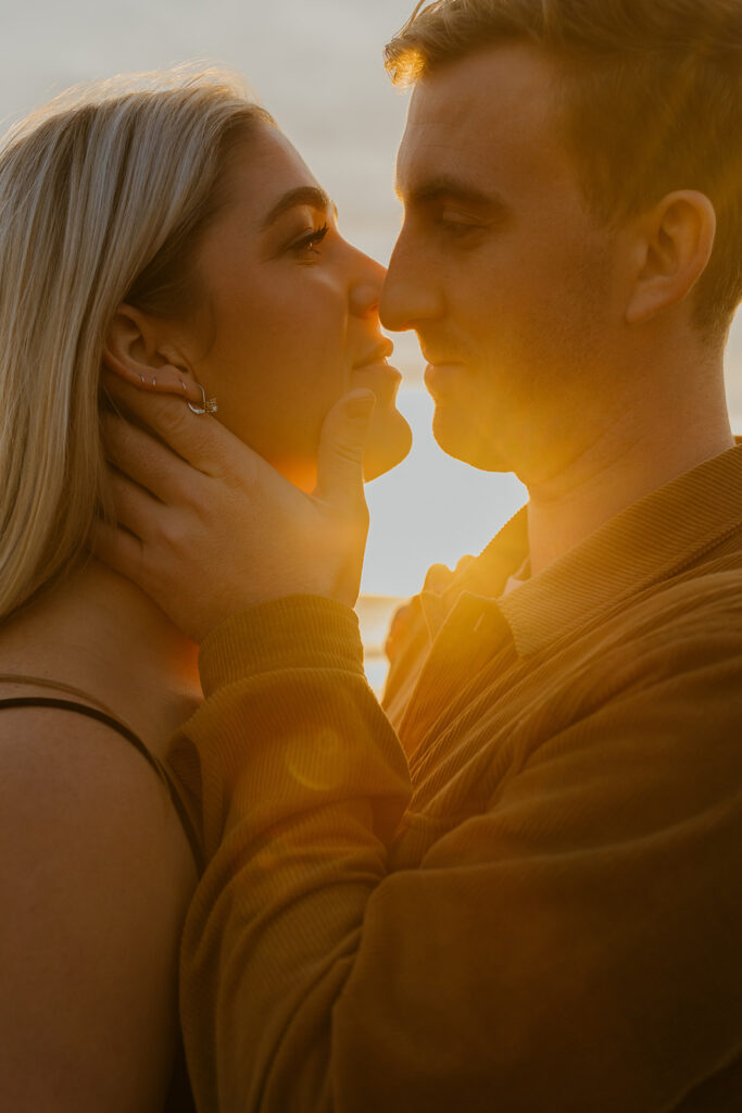 Casual sunset engagement photos at Natural Bridges State Beach in Santa Cruz, CA