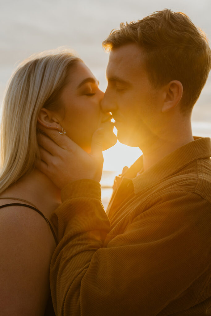 Casual sunset engagement photos at Natural Bridges State Beach in Santa Cruz, CA
