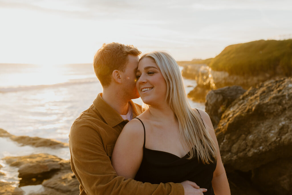 Casual sunset engagement photos at Natural Bridges State Beach in Santa Cruz, CA