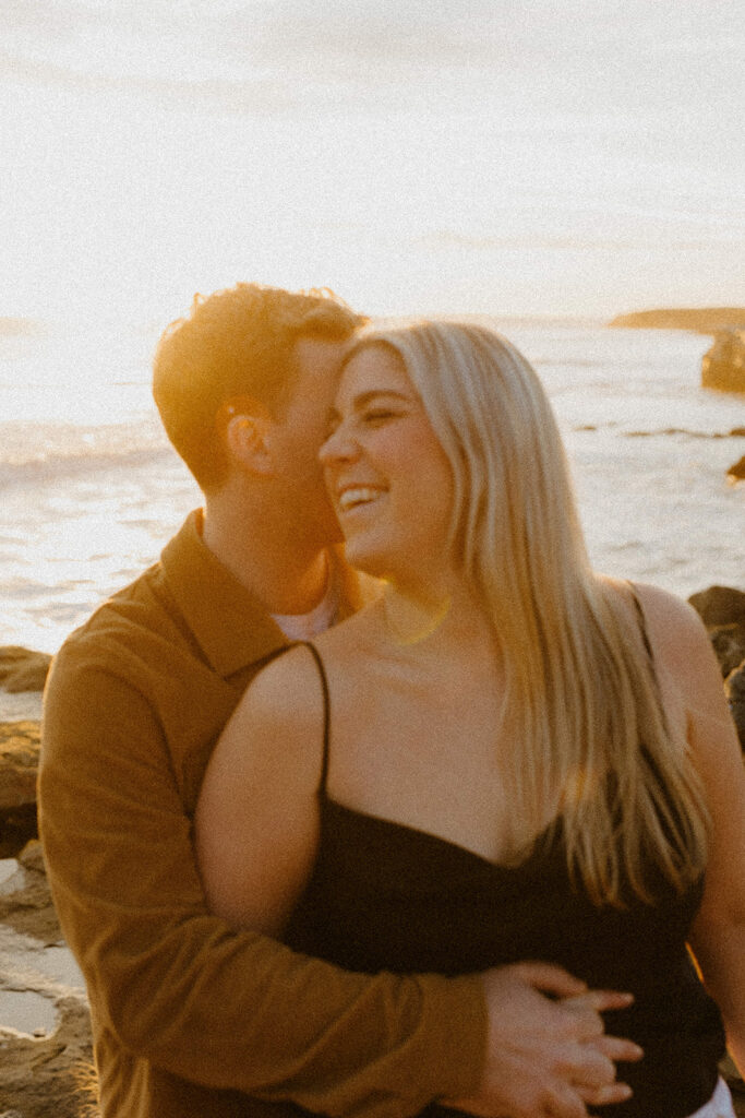 Casual sunset engagement photos at Natural Bridges State Beach in Santa Cruz, CA