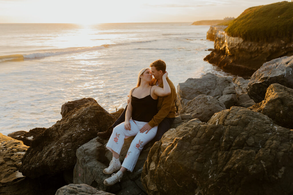 Casual sunset engagement photos at Natural Bridges State Beach in Santa Cruz, CA