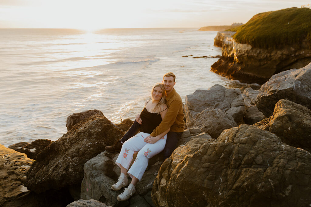 Casual sunset engagement photos at Natural Bridges State Beach in Santa Cruz, CA