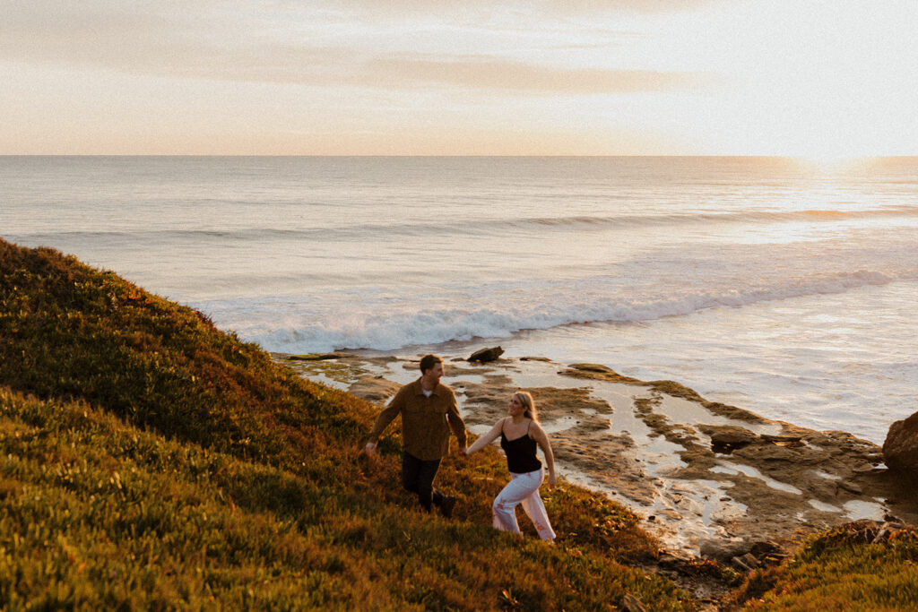 Casual sunset engagement photos at Natural Bridges State Beach in Santa Cruz, CA