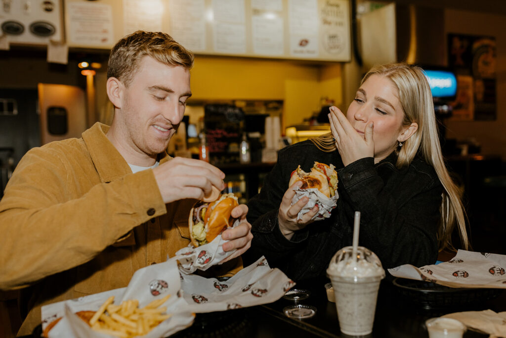Playful couples photos at the original Betty's Burgers in Santa Cruz, CA