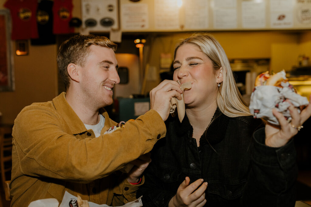 Playful couples photos at the original Betty's Burgers in Santa Cruz, CA