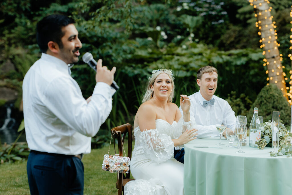 Bride and groom at sweethearts reception table