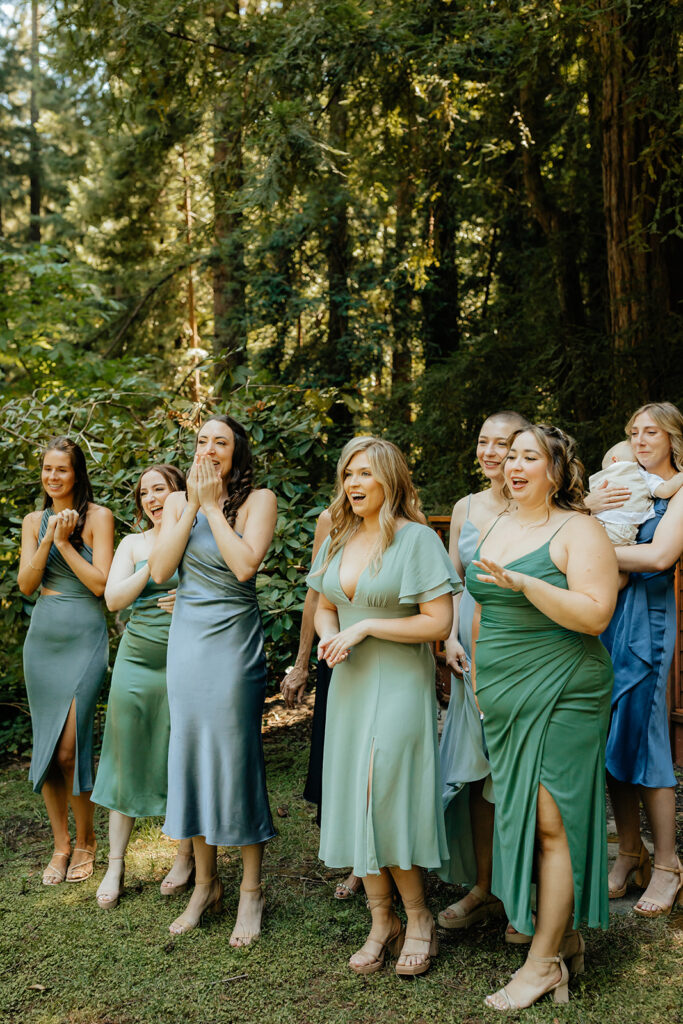 Brides first look with bridesmaids
