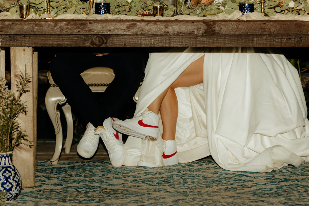 Bride and groom wearing nikes