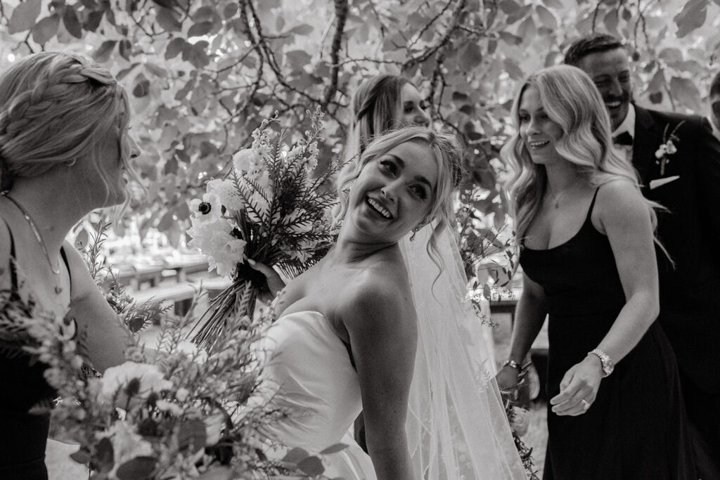 Bride and groom entering reception