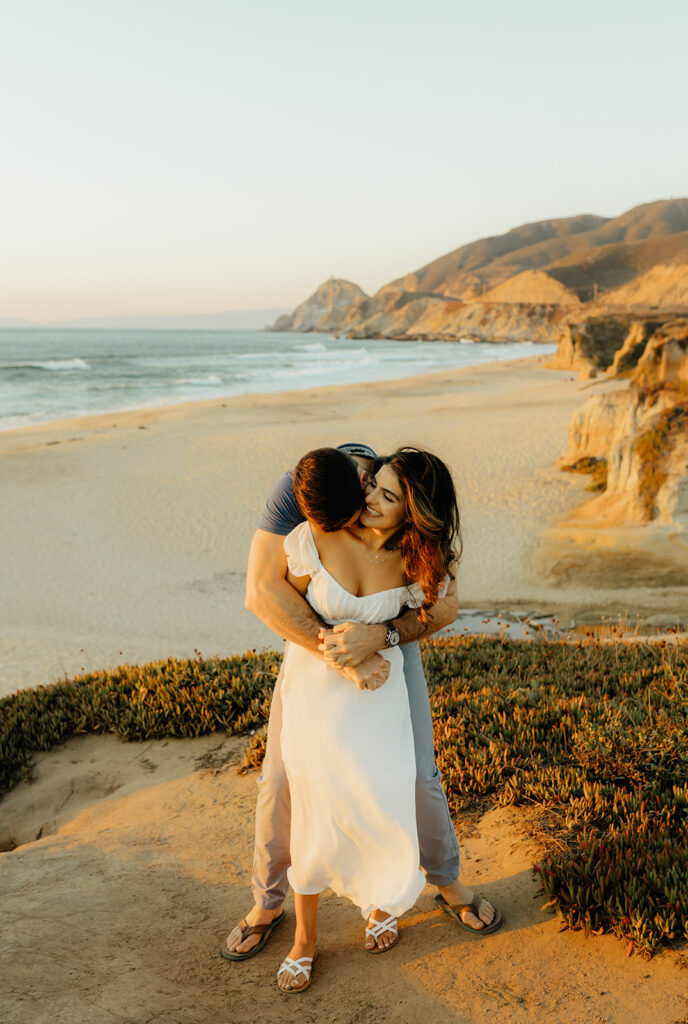 Couples Half Moon Bay engagement photos on the beach