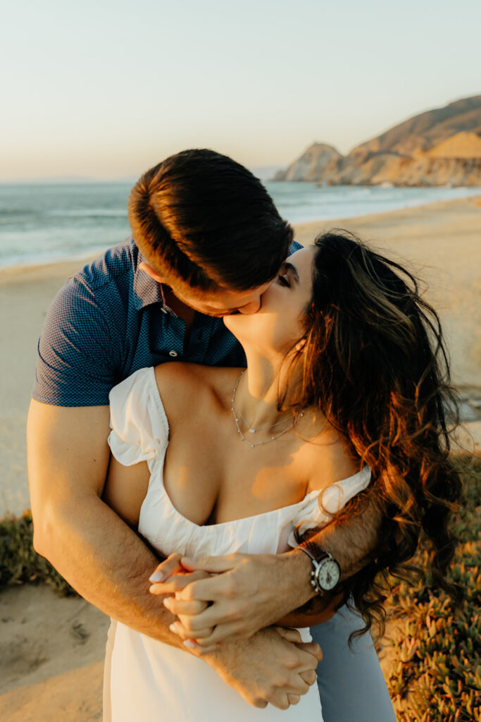 Couples Half Moon Bay engagement photos on the beach
