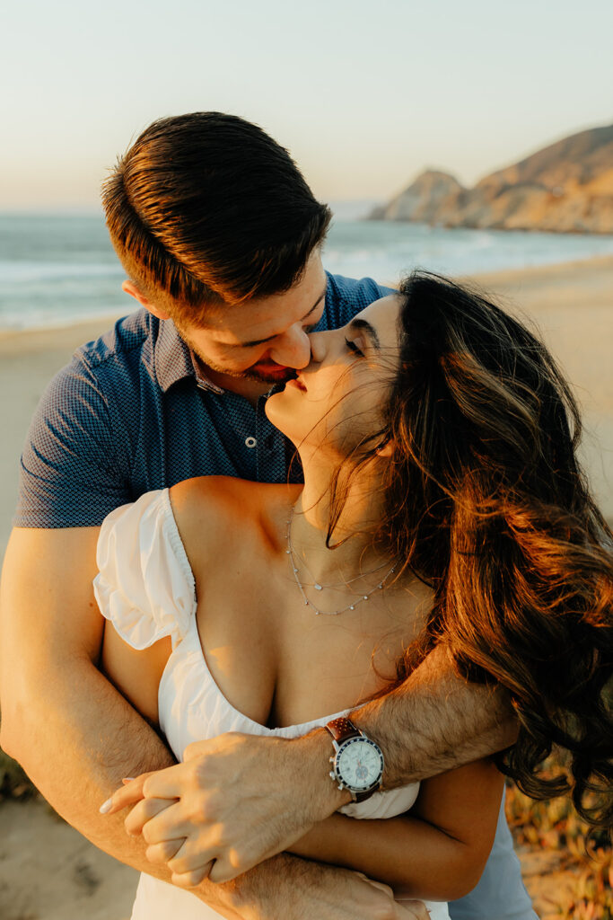 Couples Half Moon Bay engagement photos on the beach