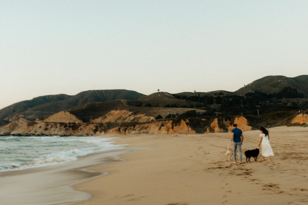 Couples Half Moon Bay engagement photos on the beach
