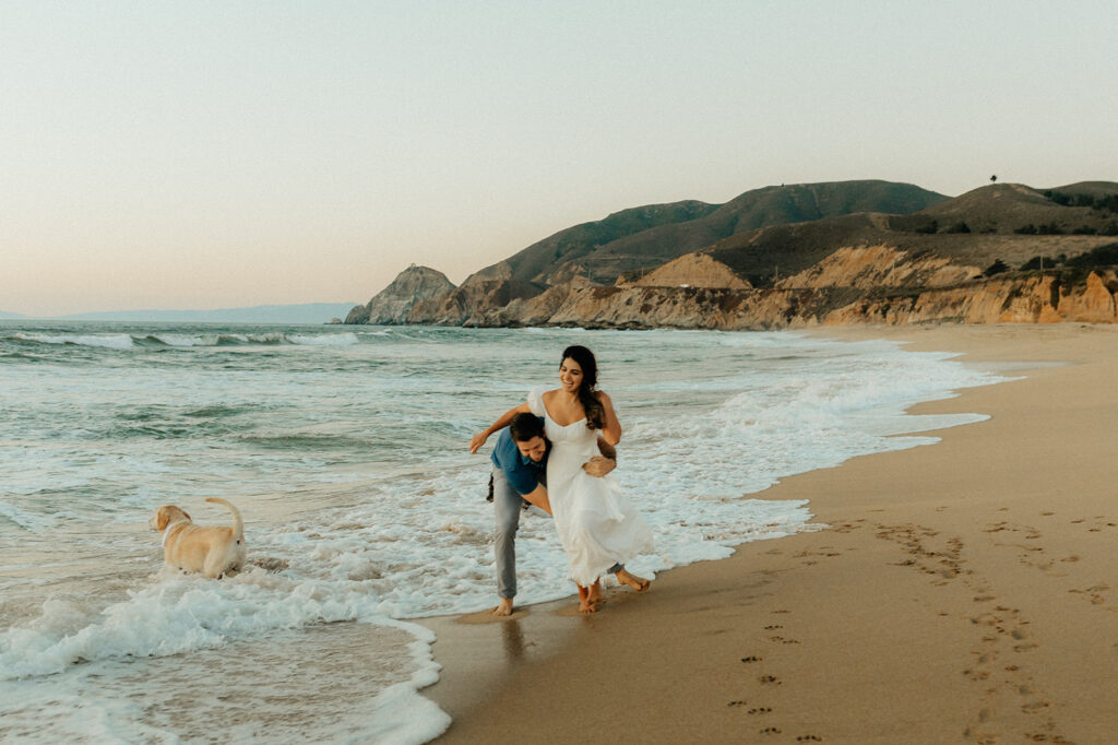 Couples Half Moon Bay engagement photos on the beach