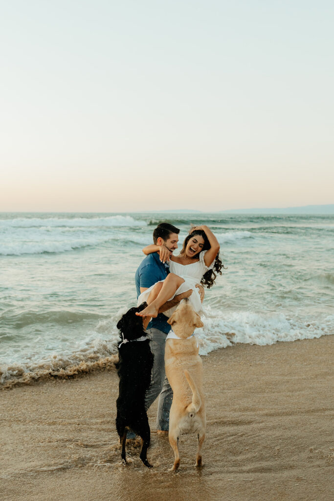 Couples Half Moon Bay engagement photos on the beach