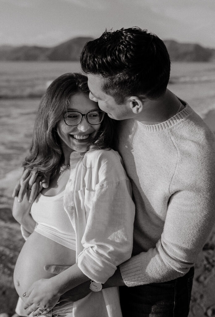 Couples maternity pictures on Bakers Beach in San Francisco, California