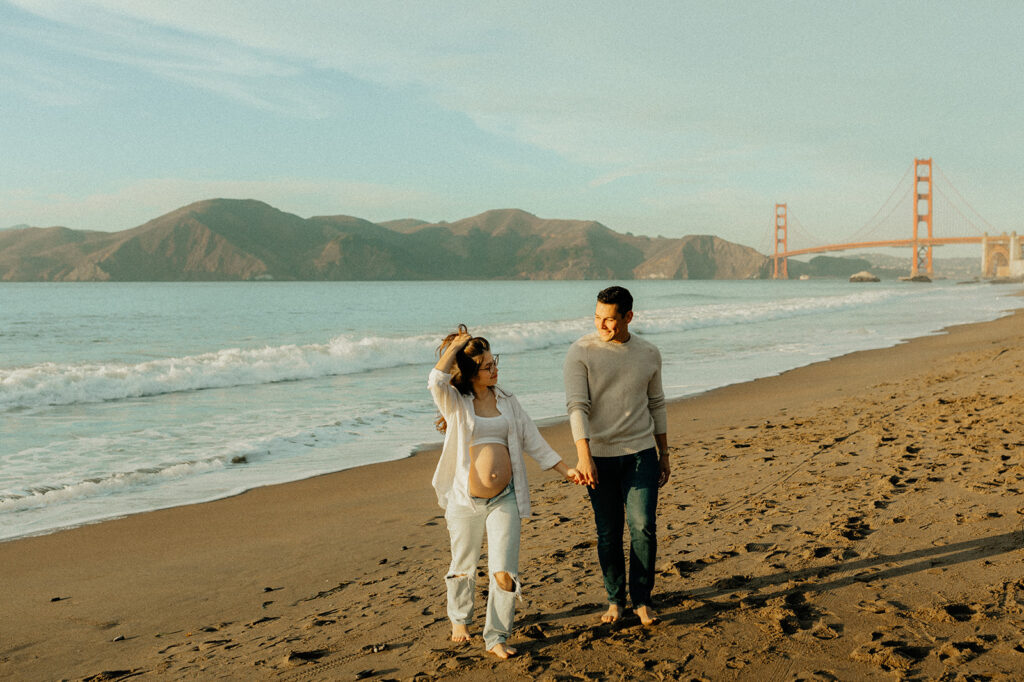 Couples maternity pictures on Bakers Beach in San Francisco, California