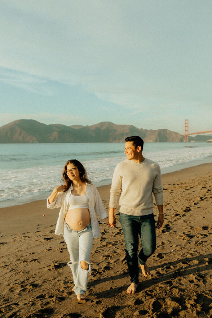Couples maternity pictures on Bakers Beach in San Francisco, California
