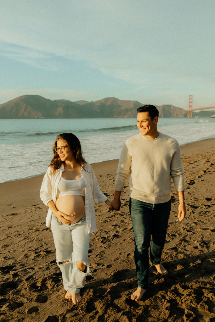 Couples maternity pictures on Bakers Beach in San Francisco, California