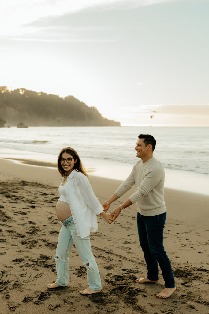Couples maternity pictures on Bakers Beach in San Francisco, California
